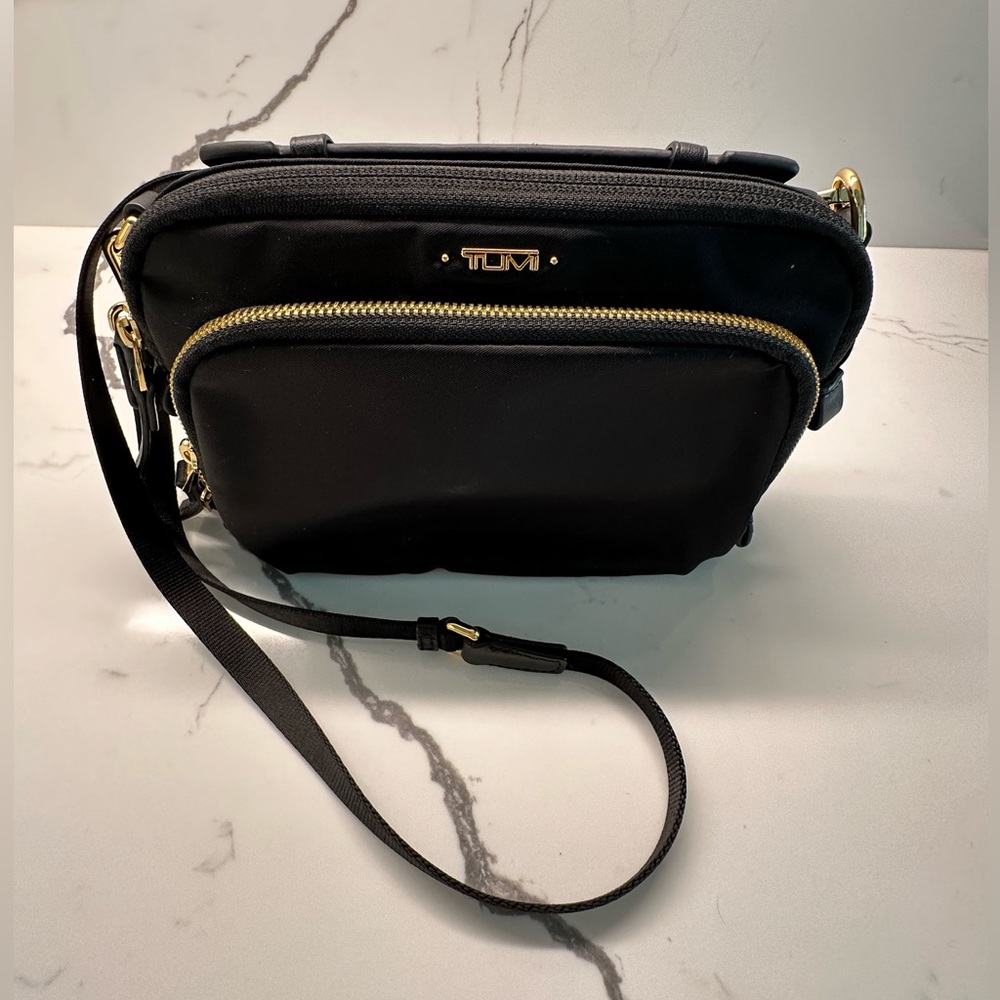 Genuine TUMI cross-body travel bag